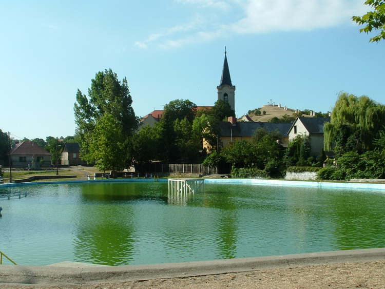 The Lake Bath of Bodajk village. You can see the Calvary Hill in the background