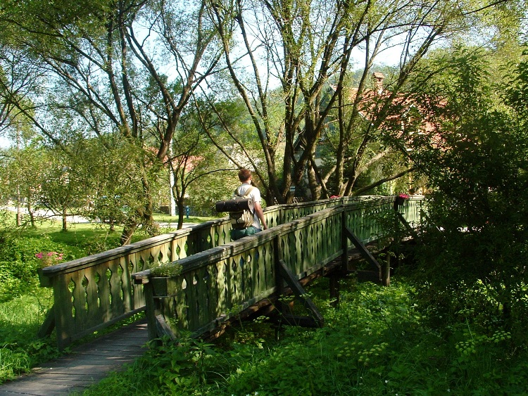 Wooden pedestrian bridge over the creek in Uppony